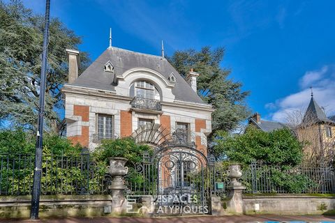 In the heart of the city of Neuilly Plaisance, and only 15 minutes from Nation by RER, stands this former private mansion built in 1885 by the architect BOURNIQUEL. A true work of art, this building clad in purple slate reveals 177m2 with a total bas...