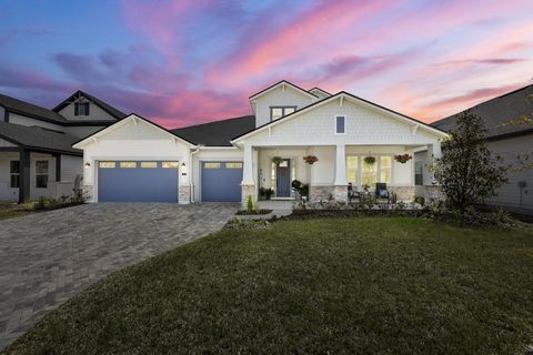Modern coastal-style masterpiece located waterfront in desirable Highpointe at Rivertown. This Mastercraft built home features striking design elements with rich black doors/moldings and contrasting tile flooring, creating a sophisticated aesthetic. ...