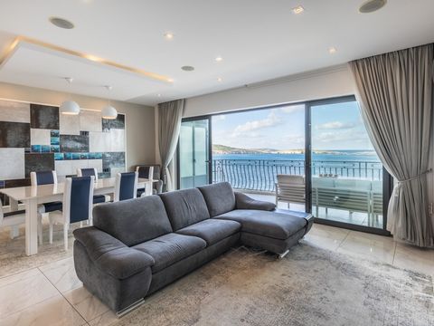 Remarkable seafront apartment in the heart of Bugibba. This beautiful property perfectly blends sophistication and comfort offering a truly exceptional living experience. Boasting an unrivaled location with stunning panoramic views of the azure Medit...