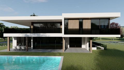 Luxury villa, of contemporary architecture and the highest quality finishes, located in Herdade da Aroeira. Inserted in a 1200 sqm lot, with swimming pool and garden and with a 435 sqm construction area, the villa is distributed as follows: Ground Fl...