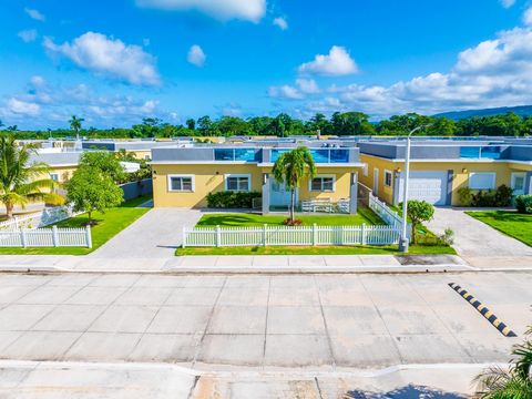 Experience the ultimate beachfront lifestyle in this modernized, fully furnished 4 bedroom 3 bathroom villa nestled within a secure gated community. This property boasts contemporary elegance and comfort featuring sustainable living as it's equipped ...