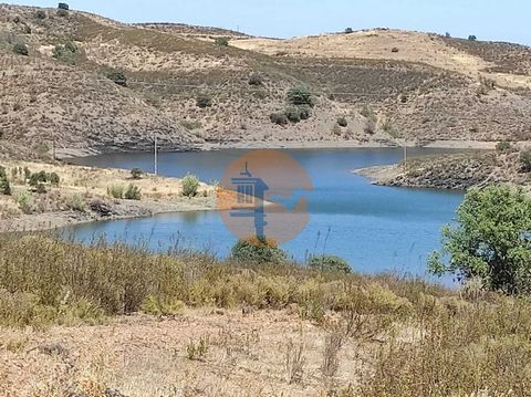 Land with 100,060m², 10 hectares. Next to the 'BARRAGEM DA CAROUCHA' - in Botelhas, Castro Marim. Located next to the lake of the Caroucha Dam. It confronts the Dam. Unobstructed view of the Algarve mountains and the dam lake. Land with some trees. W...