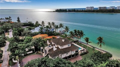 EXQUISITE HOME. WHERE SARASOTA BAY MEETS THE GULF OF MEXICO. NORTH SIESTA KEY. Do not miss this unparalleled opportunity to own an exquisite waterfront home, where luxury, location, and breathtaking views combine to create the ultimate island sanctua...