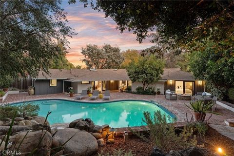 One of a kind hard to find sprawling park-like grounds (with room for ADU) south of the boulevard, this reimagined and expanded single-story home blends classic ranch charm with modern luxury and stands out distinctively in the highly sought-after ne...