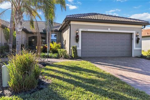 Stunning Updated 2 Bed, 2 Bath + Den Villa in the Highly Desirable Islandwalk Community This beautifully updated 2-bedroom, 2-bath villa with a den offers a perfect blend of style, comfort, and modern upgrades. The gourmet kitchen features built-in w...