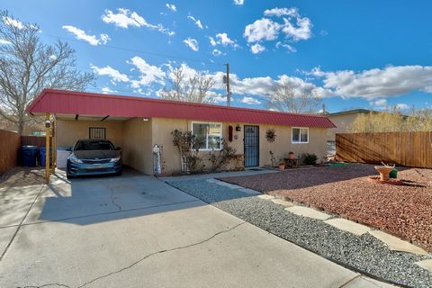 Step into this charming North Valley gem! Featuring an excellent floor plan, the sunny kitchen boasts stylish cabinets, ample counter space, and a cozy breakfast nook. Refrigerator conveys as is. The oversized laundry room offers abundant storage, wh...