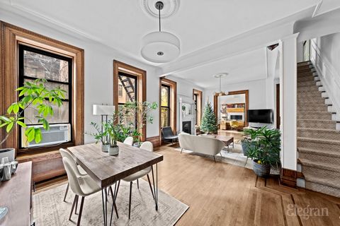 Tucked away on a charming tree-lined street just steps from Riverside Park, this remarkable HUGE duplex seamlessly combines the elegance and privacy of a townhouse with the ease and convenience of a historic elevator building. South-facing and spanni...