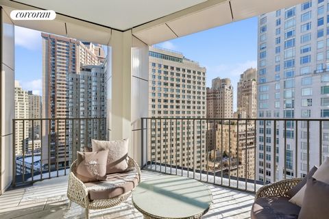 Perched high above the city, Residence 20B is a well-appointed corner two-bedroom home with north and east exposures, a private terrace, and striking views over Columbus Circle and Broadway. The loft like open-plan living and dining area is bathed in...