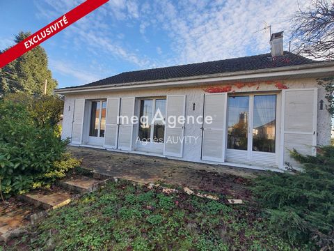 A proximité des commerces et écoles, pavillon des années 70.