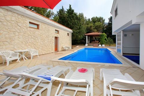 Why stay here? Here is a perfect seaside destination. With a fantastic location on the beach, this holiday home in Starigrad is spacious for a large group or families. There are a private swimming pool and a sauna to relax while enjoying the sea bree...