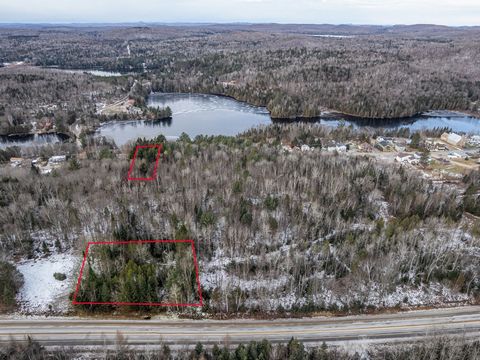 Two magnificent wooded RESIDENTIAL/COMMERCIAL lots (total: + 133,400 sq. ft. (3.06 acres) located on Route 323 and Route des Cantons. In the center of the village of St-Émile de Suffolk. Close to services. Lots are bounded and ready to build. Electri...