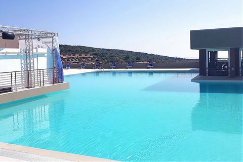 This comfortable apartment on the Italian island of Sardinia has a garden and 2 swimming pools, one of which is ideal for children. The residence is therefore particularly suitable for spending quality time with your loved-ones. With its nice locatio...