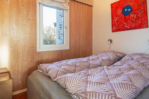 In the popular holiday home area by Sønderballe Strand you will find this high-rise holiday home with a really nice view of the water. The cottage has 25 m2 conservatory facing the water. From the living room as well as in particular from the conserv...