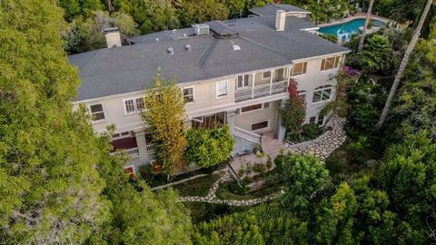 For Sale after 48 years! Distinctive 2-story home with full basement on more than half an acre lot, with two additional parcels (APN ... & ... for access, in a private gated celebrity-studded community in coveted Los Feliz Oaks neighborhood. Unparall...