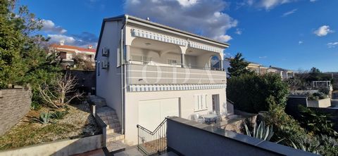 Location: Primorsko-goranska županija, Novi Vinodolski, Klenovica. A charming house that underwent renovation in 2002, with a position that offers a stunning view of the sea. Its elegance is expressed through two separate apartments - a ground-floor ...