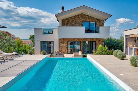 Location: Vodnjan Built: 2018 Sea: 5 km Airport: 10 km Indoor space: 350 m2 Plot size: 1447 m2 Bedrooms: 5 Bathrooms: 6 Parking: 6 Swimming pool: 55 m2 Air conditioning Garden Features: - Air Conditioning - Balcony - Dishwasher - Furnished - Internet...