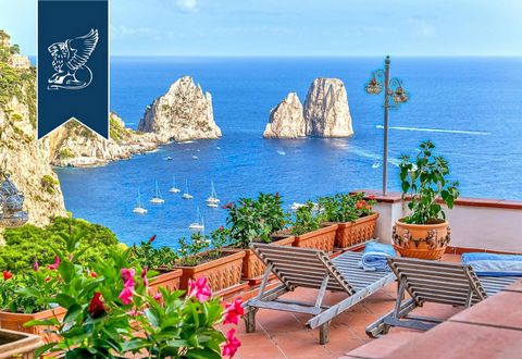 Immersed in the suggestive setting of the island of Capri, this home facing the sea for sale, with its 200 square meters distributed on three levels, represents a unique architectural work for sale. The home consists of two housing units, the main re...