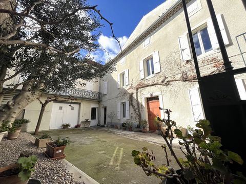 Located 35 minutes from the beaches, 20 minutes from Narbonne and 5 minutes from the motorway, come and discover this magnificent mansion with preserved charms. The ground floor has a large entrance hall leading to a living room and an office with ma...