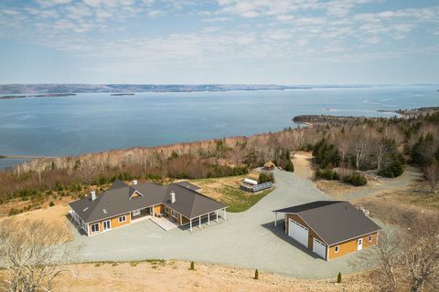 Golden View Drive - Ultimate Country Estate in Cape Breton, Nova Scotia. One of the best exclusive waterfronts and views on the UNESCO-designated Bras D'Or Lake. This unique 343 acres property: 4 PID / one of them 6 acres with 850 feet beach line has...