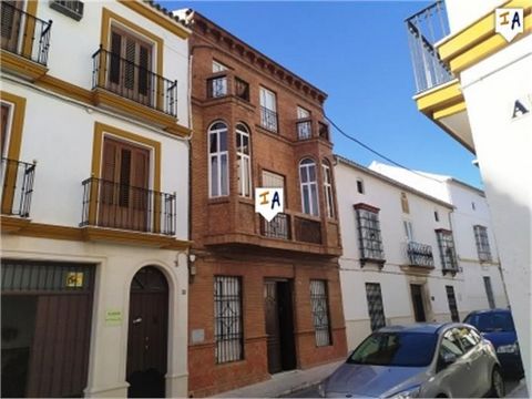 This beautiful property has an amazing facade which stands out from the rest of the street screaming I am a property of elegance and tradition making you want to peak inside. The main entrance leads in to a typical Andalucian entrance hall with origi...