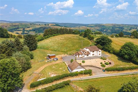 * Immediately available, with no upward chain. * A substantial detached country house set in approximately 1.5 acres of grounds in all, including a hilltop paddock to the rear of the house with delightful 360-degree views over the surrounding country...