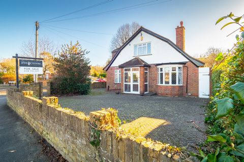 Fine and Country are delighted to introduce to the market this Dutch barn style three double bedroom, two bathroom detached bungalow. On the ground floor the accommodation offers flexibility with three separate reception rooms, large kitchen/breakfas...