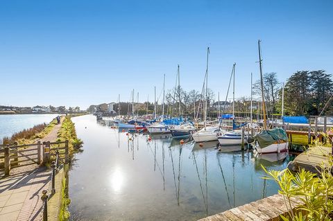 INTRODUCTION In an Area of Outstanding Natural Beauty (AONB) and close to Emsworth village centre, this is an idyllic waterside home within easy walking distance of essential amenities. The property sits beside, and enjoys far-reaching views over, Sl...