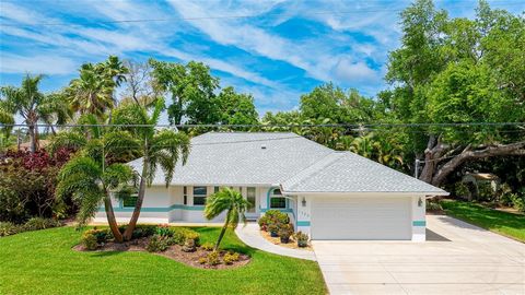 Under contract-accepting backup offers. Welcome to your Englewood Oasis, situated on a corner lot just moments away from the shores of Manasota Key Beach. This meticulously designed 3-bedroom, 2-bathroom pool home blends elegance with modern updates....