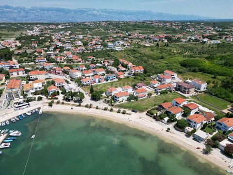 Location: Zadarska županija, Vrsi, Vrsi. ZADAR, VRSI - Building land 30m from the sea. Spacious land for sale in an exceptional location by the sea. The building plot covers 2895m2 and represents an excellent investment opportunity considering its lo...
