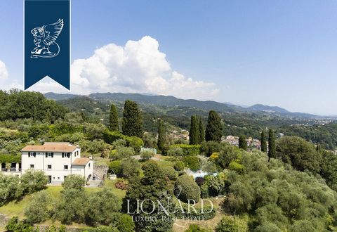 This enchanting villa is currently up for sale and located in an elevated position in Sarzana, in the province of La Spezia, in close vicinity to the stunning Ligurian Sea. The villa is girdled by a multi-level, flourishing park sprawling over roughl...