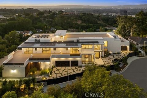 THE PINNACLE! ONE OF A KIND CITY VIEW ESTATE ! Perched in the prestigious ROYAL OAKS OF ENCINO on a CUL-DE-SAC find a MODERN ARCHITECTURAL MASTERPIECE with BREATHTAKING VIEWS of San Fernando Valley. Boasting 7 bedrooms and 9 full bathrooms across 11,...