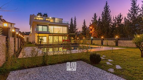 This 5+1 luxury villa emphasizes comfort, peace, and privacy. With bright rooms filled with natural light and large windows, it offers a spacious living experience. The private pool in the large garden adds a touch of outdoor luxury and enjoyment. Vi...