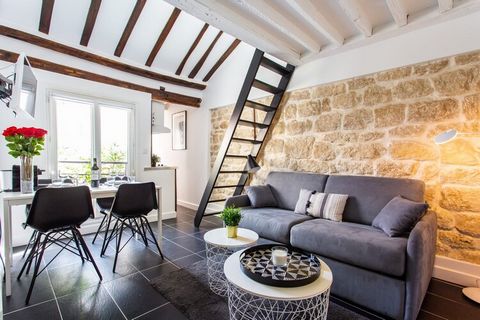 Checkmyguest offers you this 30m² apartment in the heart of the lively Saint-Georges district. It offers optimized space ideal for comfortably accommodating up to four people. Enjoy the proximity of iconic monuments such as the Sacré-Coeur and the Mo...