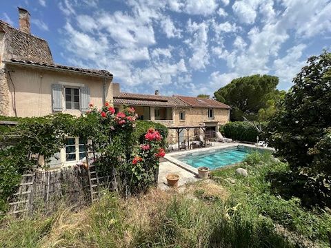 AT THE HEART OF LUBERON PARK At the limit of Menerbes and Oppède This hamlet farmhouse dating from the 18 th has a useful surface of approximately 320 sqm with a courtyard, it has a lot of charm. This home can be used in two separate homes but the wh...