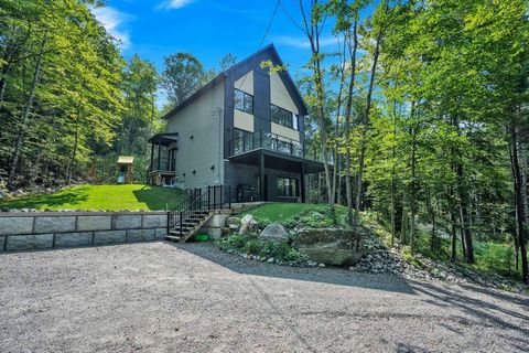 Discover this striking modern mountain-inspired haven. Boasting 1,680 square feet of thoughtfully designed living space, this 3+1 bedroom residence showcases a fully finished basement with versatile rooms adaptable to your lifestyle. The open-concept...