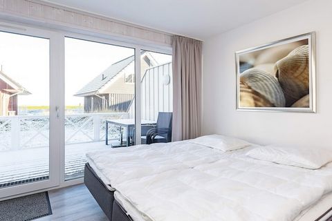 This luxuriously furnished semi-detached, 2-storey, Danish holiday home is located in the well-known marina Marina Wendtorf by Kiel Bay in the 2nd row, beautifully surrounded by beautiful sandy beaches and a nature area. The house is modernly decorat...