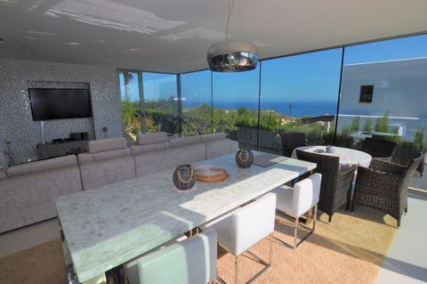 ✓Villa with Sea Views and Pool in La Cumbre del Sol, Benitachell, Costa Blanca. This villa has been refurbished, there is a large open plan living area with panoramic views, with open plan kitchen and different areas, such as a cosy fireplace area an...