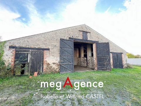 Grange à renover sur 600 m2 de terrain.