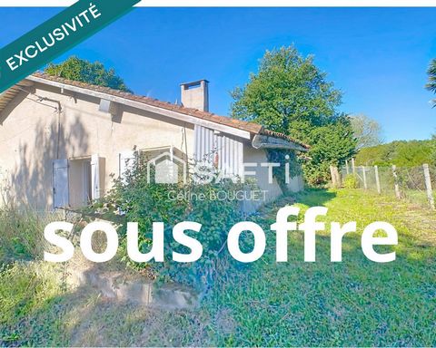 Maison à rénover avec garage et jardin