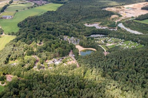 This comfortable chalet is located in the holiday park Resort Maasduinen, in an area with lots of water and nature, on the edge of the National Park of the same name. It is 12 km southwest of the city of Venlo and a stone's throw from the Dutch-Germa...
