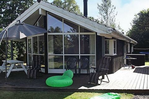 A holiday cottage with whirlpool, located only a few minute's walk from a family friendly beach. This is a wonderful house for children, with a large yard where they can play ballgames, use the swing or the trampoline (at your own risk) or sit around...