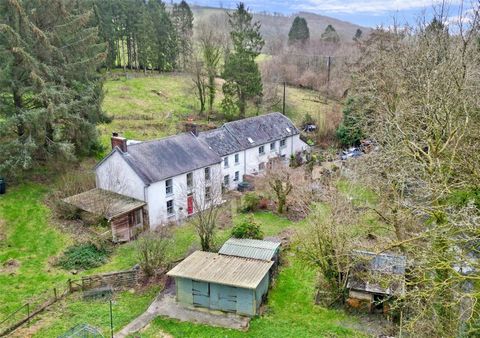 Nestled within the picturesque Carmarthenshire countryside, this charming country estate occupies a serene location in a delightful wooded valley. Comprising the enchanting 6-bedroom Mill House and the exquisitely converted former Woolen Mill, which ...