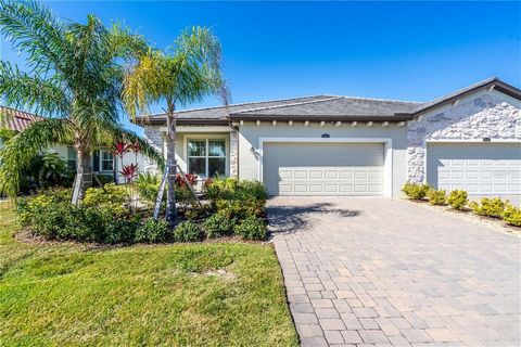 LOCATION, LOCATION, LOCATION!!! Nestled in the heart of LAKEWOOD RANCH, this Jasmine floor-plan is one of the LARGEST villas available in the area, offering almost 2,000 Sq. Ft. of living space! MAINTENANCE FREE, GATED, partial WATERVIEW, and walkabl...