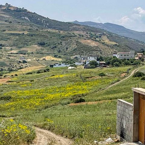 Only 5 minutes from the beach of Sidi Kankouch, known for its beautiful beaches, your agency CENTURY21 TANGIER puts at your disposal a magnificent fenced plot titled of 3002 m2, ideal to build one or more dream villas. The view is breathtaking. The l...