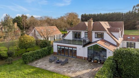 This contemporary family home has been meticulously extended and refurbished to the highest standard, offering generous living space across 3.5 acres of landscaped gardens and meadow. With five spacious double bedrooms, including a master with balcon...