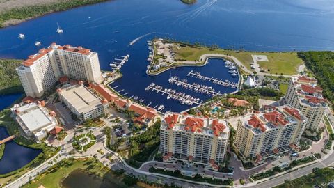 Discover luxury waterfront living from this 9th-floor, end-unit condominium offering a lifestyle of comfort and convenience within the gated community of Tarpon Point Marina. Step off the elevator into your private lobby and through your front door t...