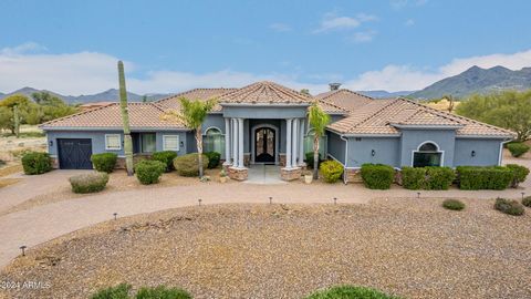 Back from Sold * Experience the epitome of desert luxury in this exquisite home on over an acre w/ No HOA * Over 5.500sf with a full attached Guest House * Main House features 5 bedrooms, 4.5 baths where 4 bedrooms boast its own ensuite. All tubs are...