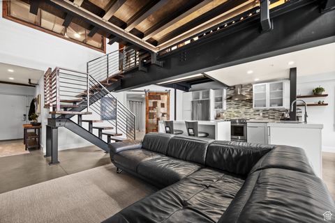 Rarely does an expansive top-floor loft become available in the highly sought-after Westgate Lofts condominium, centrally located in the heart of downtown Salt Lake City. This residence seamlessly blends comfort, style, and functionality, featuring t...