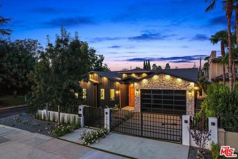 Presenting an entirely revamped single-story residence situated in the highly sought-after Chandler Estates enclave of Sherman Oaks. This 5BD/4.5BA home showcases contemporary finishes, lofty ceilings, and an abundance of natural light throughout. Th...
