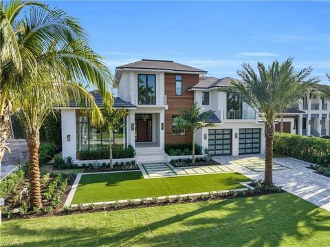 Experience this ultra-custom, ultra-luxurious home located in Aqualane Shores, one of Naples' most prestigious neighborhoods. Every detail has been envisioned & perfected by architect John Kukk and nationally renowned interior design firm Amy Storm &...